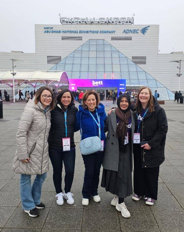 group of 5 standing outside the "ExCel London" convention center